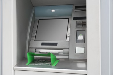 Modern automated cash machine with screen and keypad