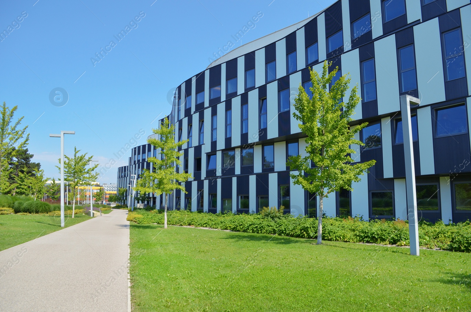 Photo of VIENNA, AUSTRIA - JUNE 18, 2018: City street with modern building on sunny day