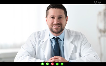 Image of Online medical consultation. Doctor working via video chat application