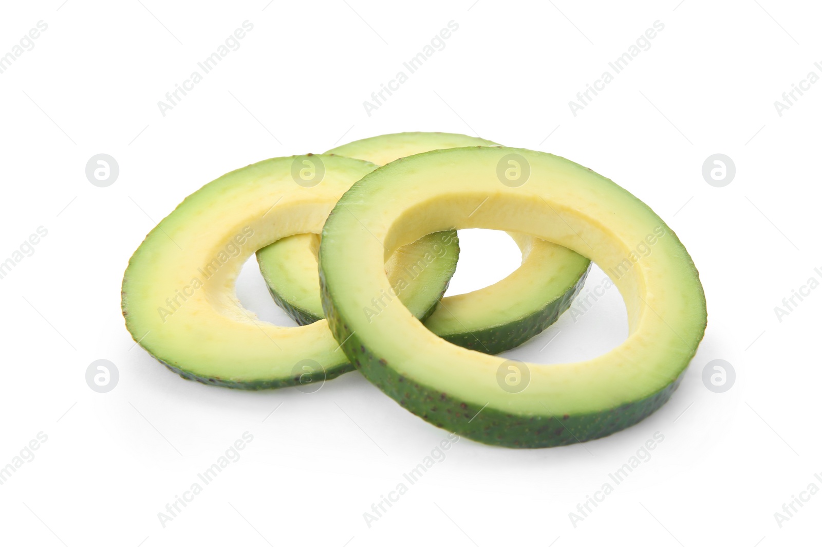 Photo of Slices of ripe avocado on white background