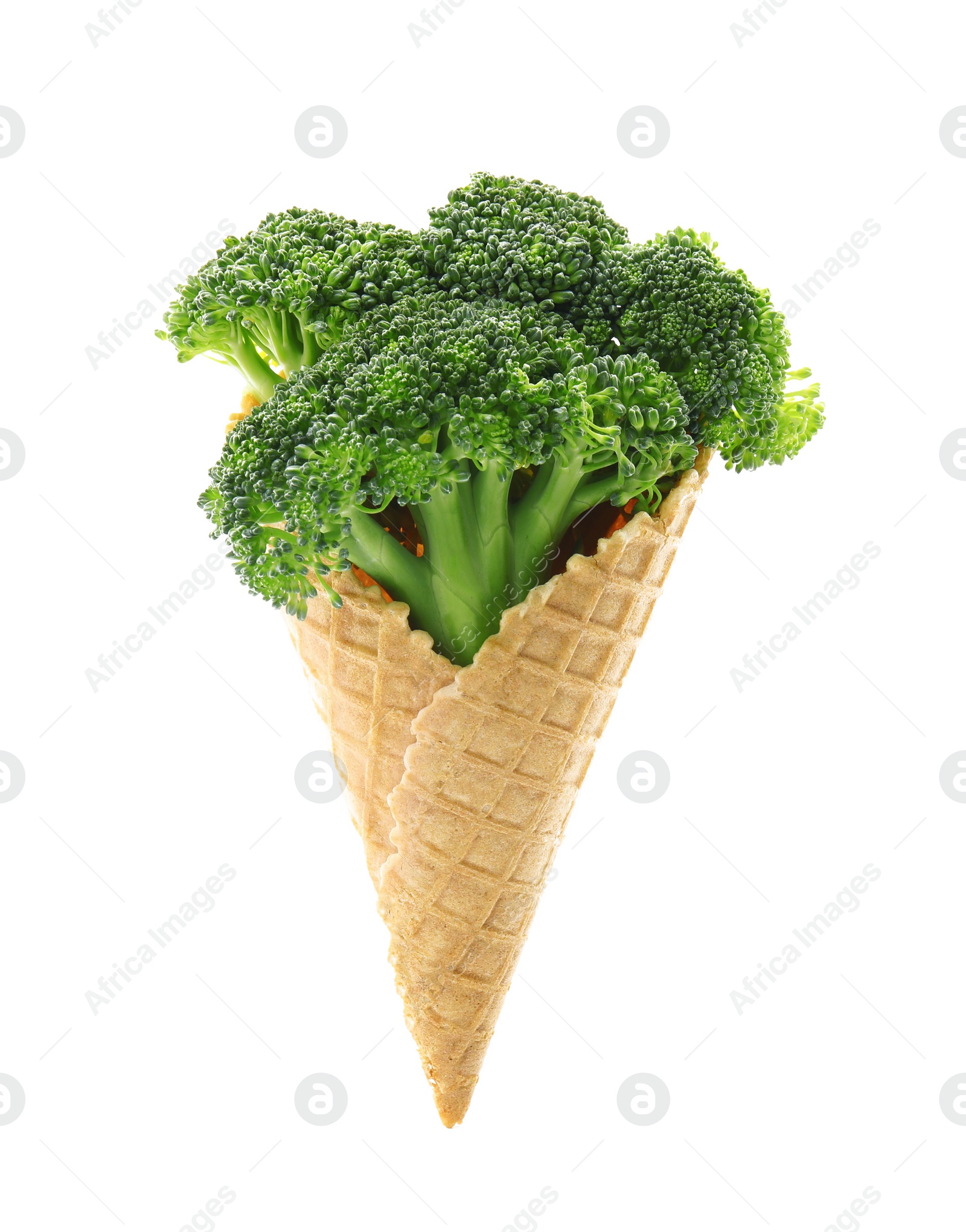 Photo of Fresh broccoli in wafer cone isolated on white