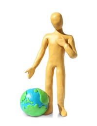 Yellow plasticine human figure with planet isolated on white