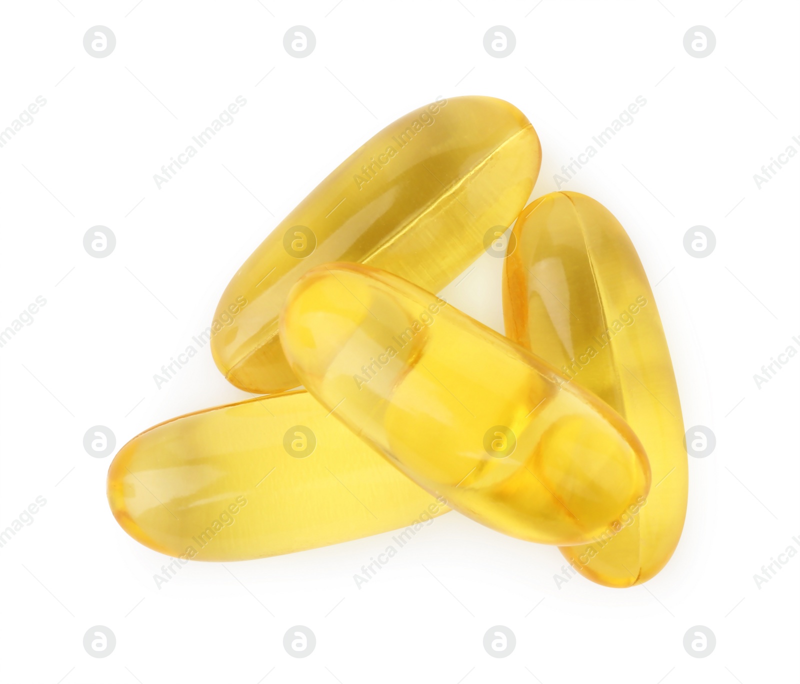 Photo of Many yellow vitamin capsules isolated on white, top view