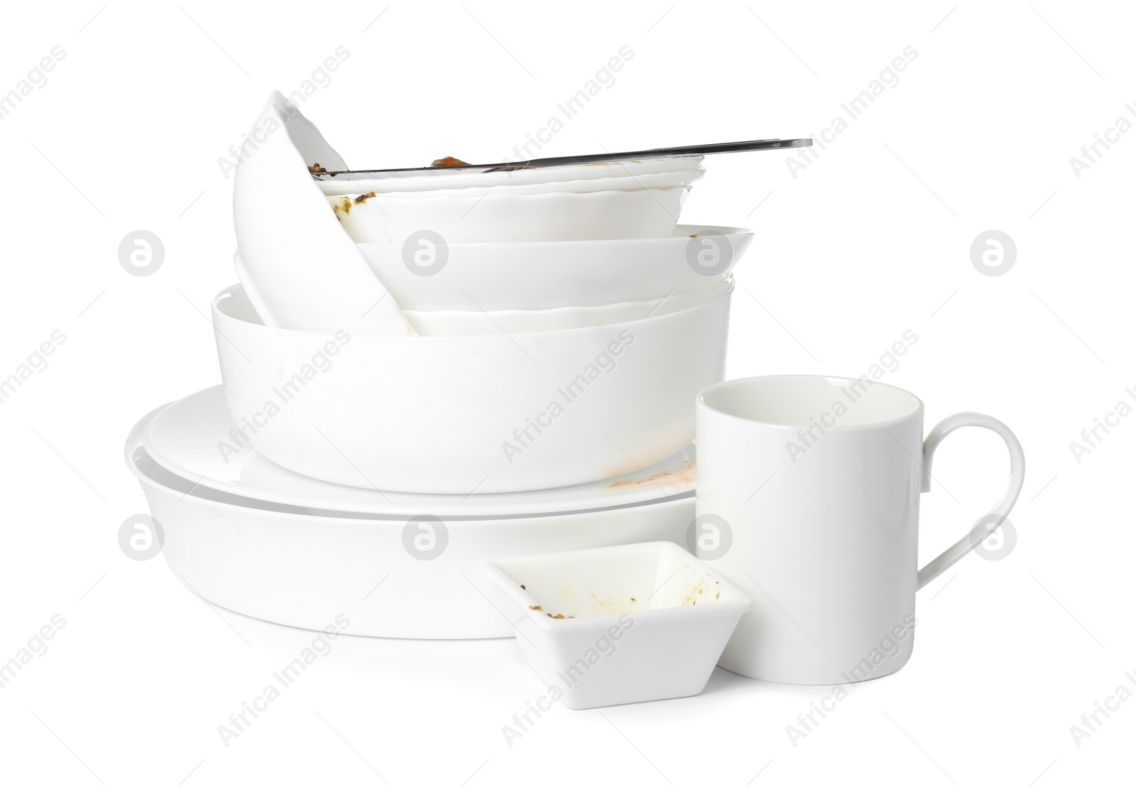 Photo of Set of dirty dishes isolated on white