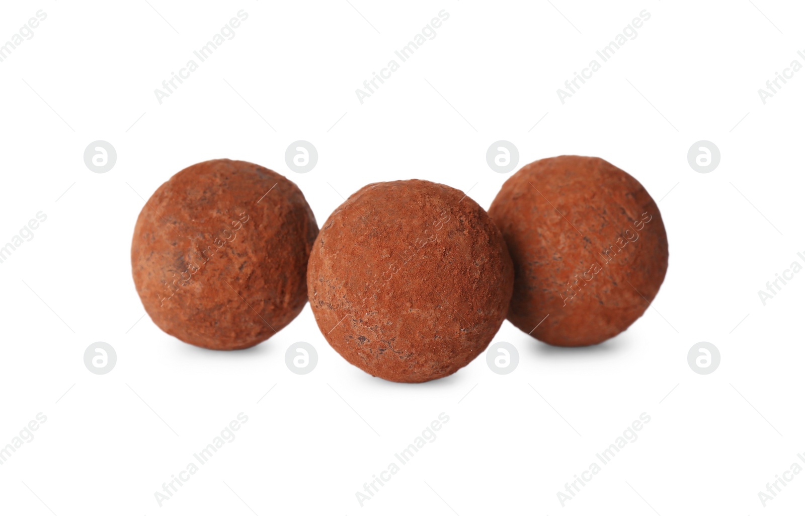 Photo of Delicious sweet chocolate candies on white background
