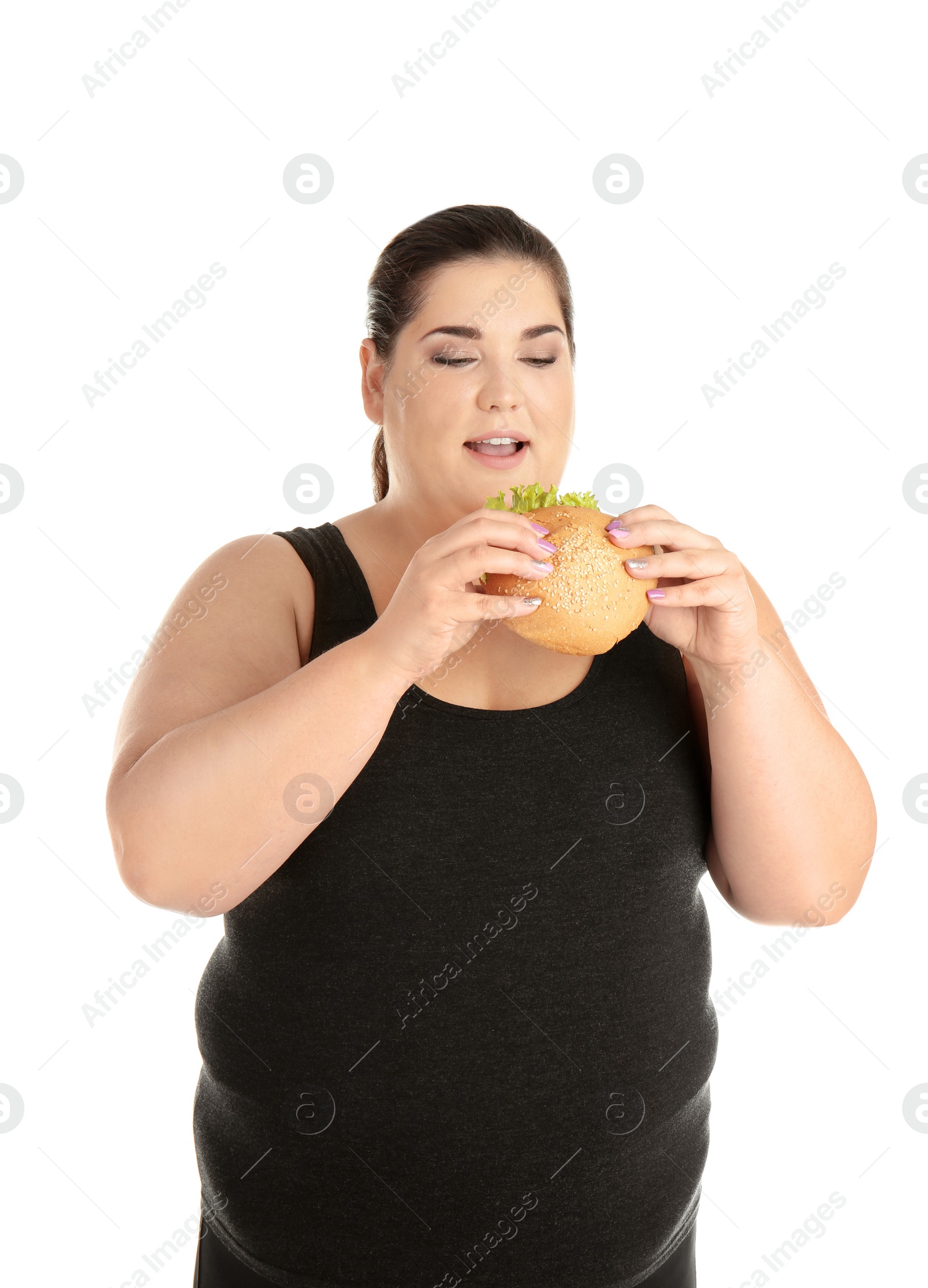 Photo of Overweight woman with hamburger on white background