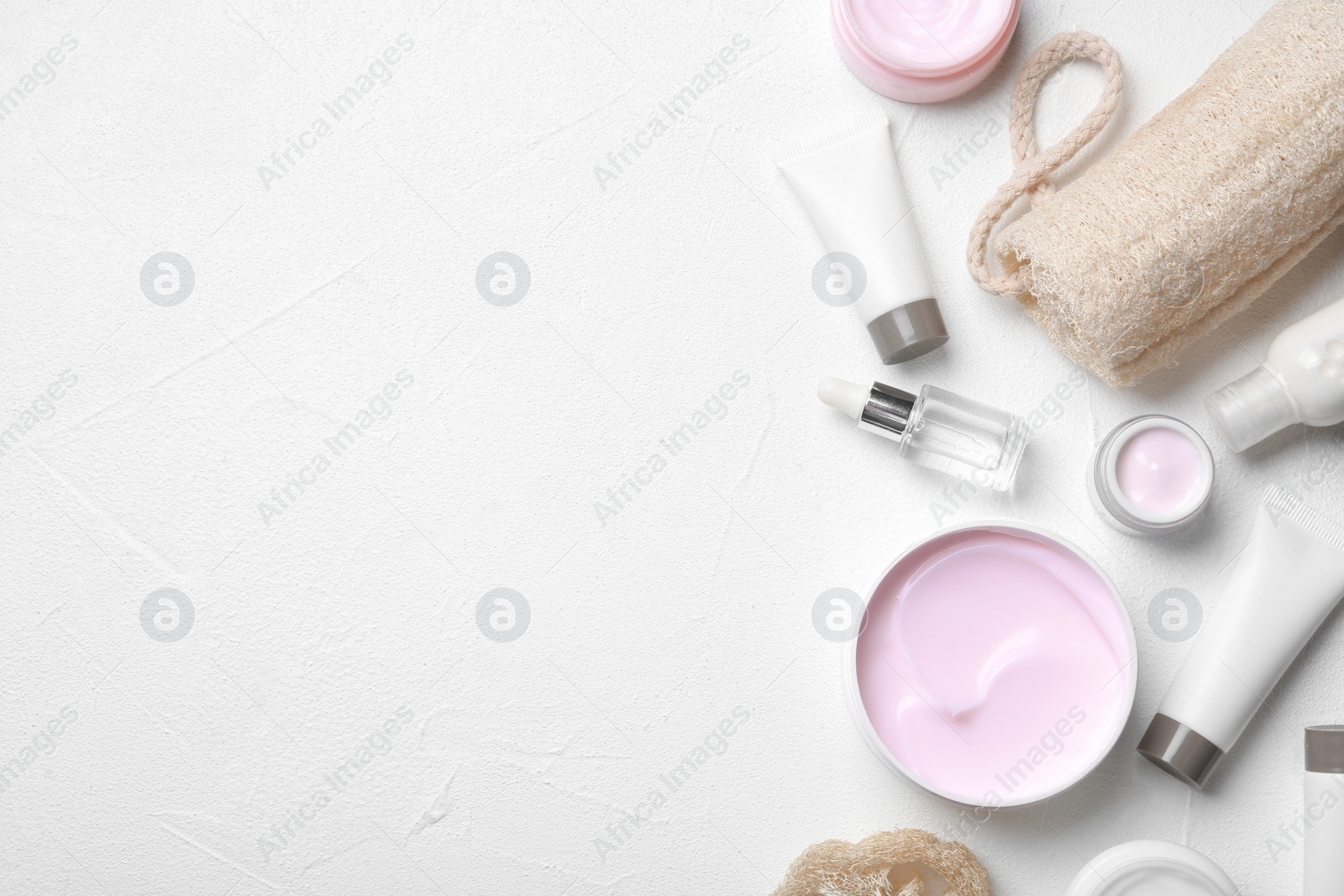 Photo of Flat lay composition with body care products and space for text on white background