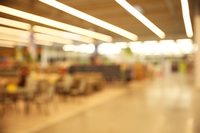 Blurred view of modern shopping mall interior