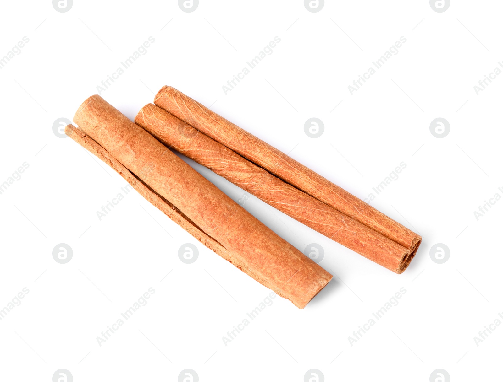 Photo of Cinnamon sticks isolated on white, top view