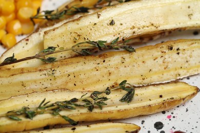 Photo of Baked white carrot with thyme, closeup view