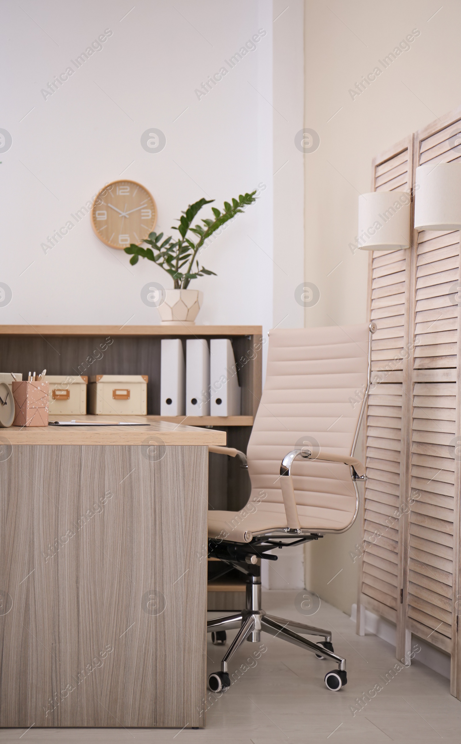 Photo of Receptionist desk in hotel. Workplace interior