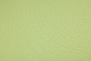 Stylish green wallpaper as background, closeup view