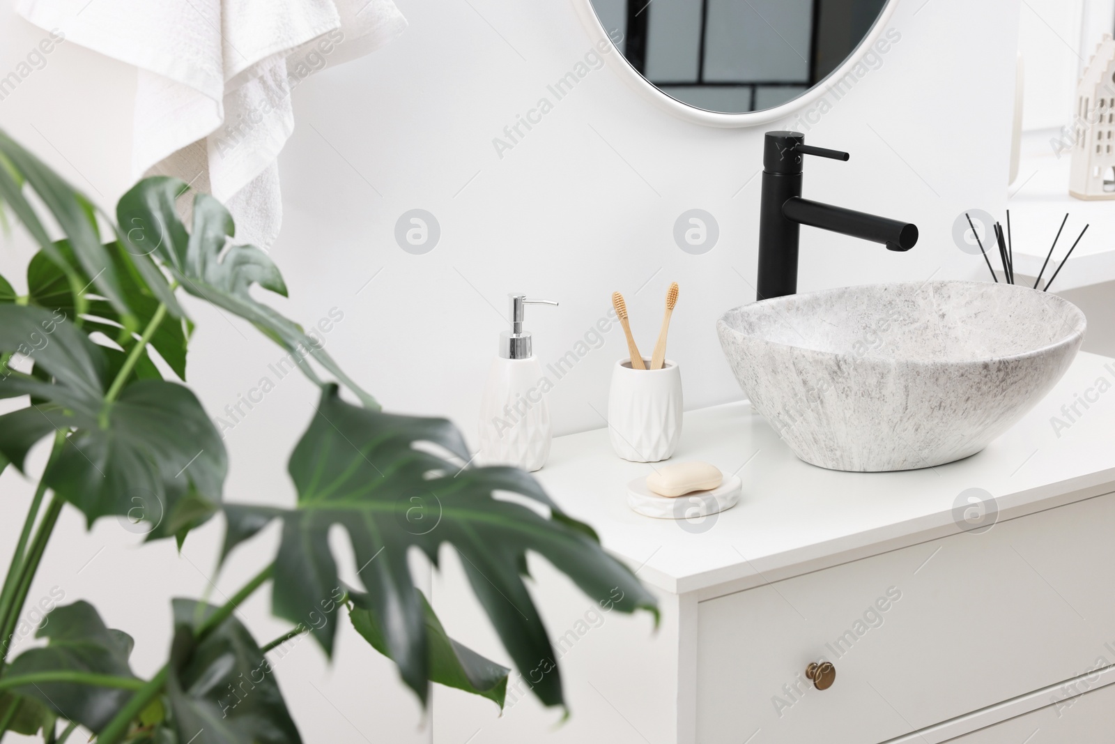 Photo of Different bath accessories and personal care products in bathroom