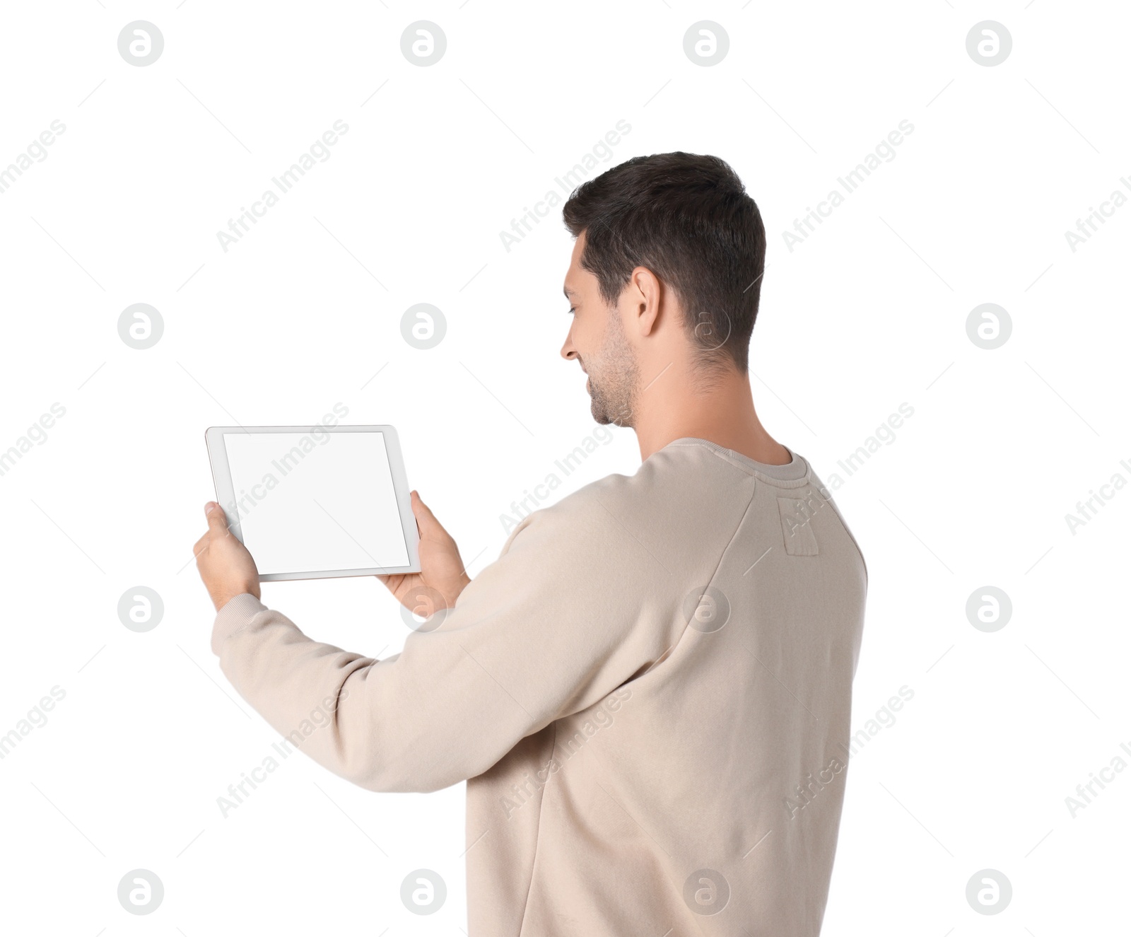 Photo of Man holding tablet with blank screen on white background. Mockup for design