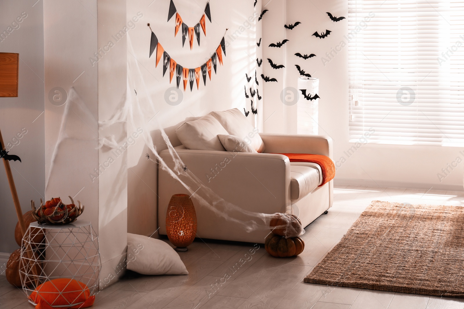 Photo of Modern room decorated for Halloween. Festive interior