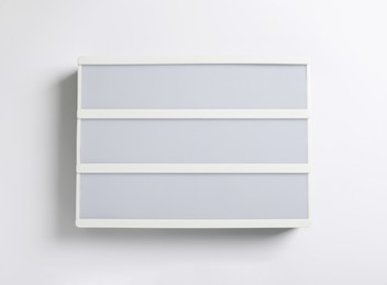 Photo of Blank letter board on white background, top view