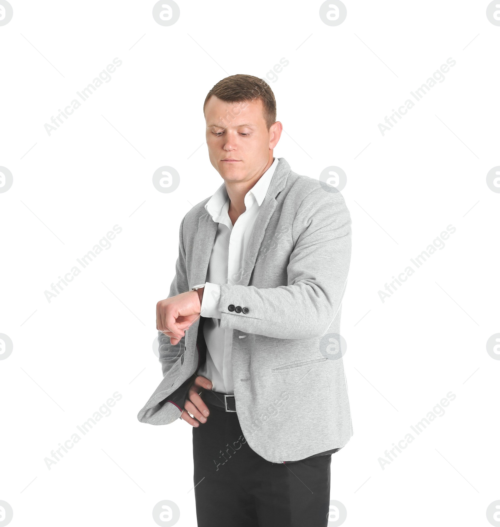 Photo of Handsome young man in suit on white background