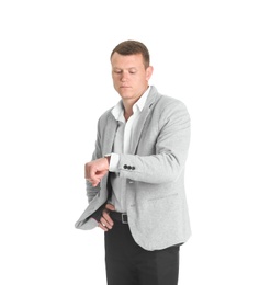 Photo of Handsome young man in suit on white background