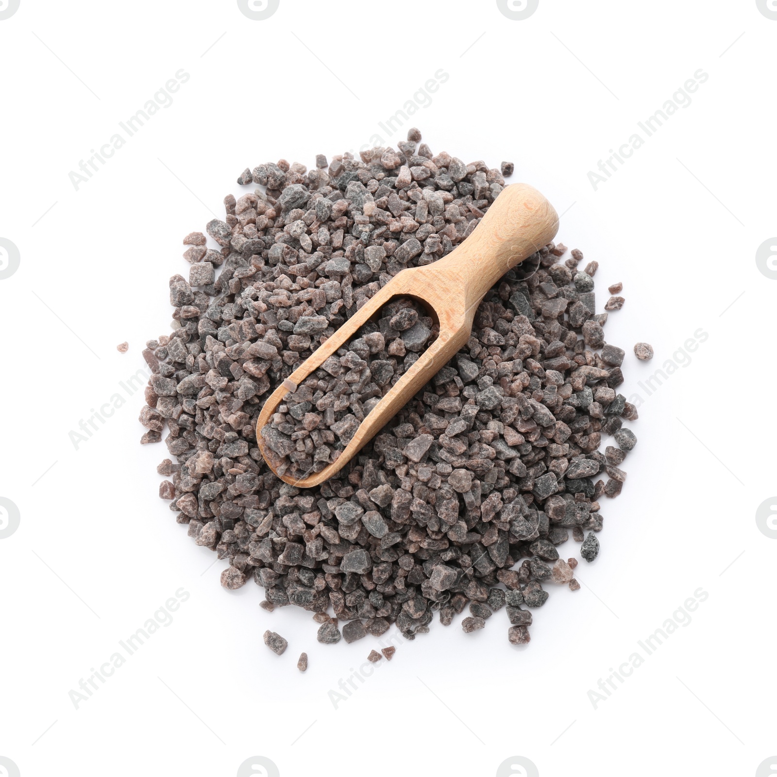 Photo of Pile of Himalayan black salt and wooden scoop isolated on white, top view