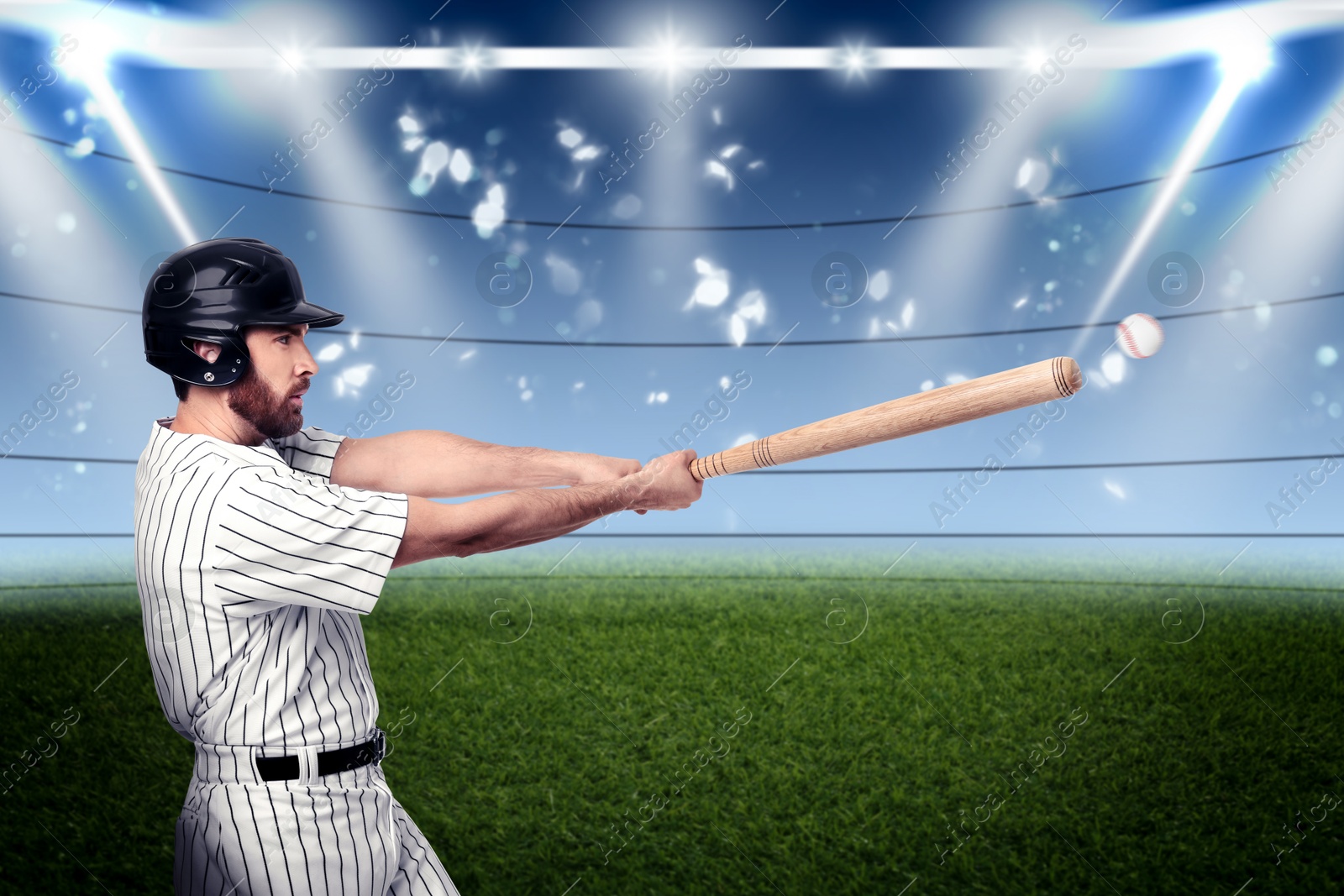 Image of Professional baseball player with bat on stadium