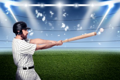 Professional baseball player with bat on stadium