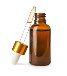 Cosmetic bottle and pipette with essential oil on white background