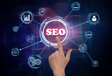 Image of SEO directions with icons of keyword research, customization and others. Man using virtual screen