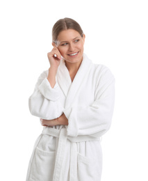 Photo of Young woman in bathrobe on white background