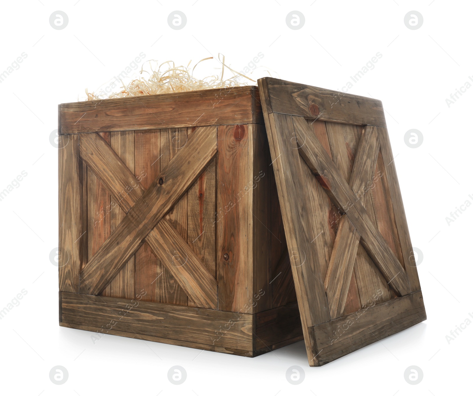 Photo of Old open wooden crate with filler and lid isolated on white