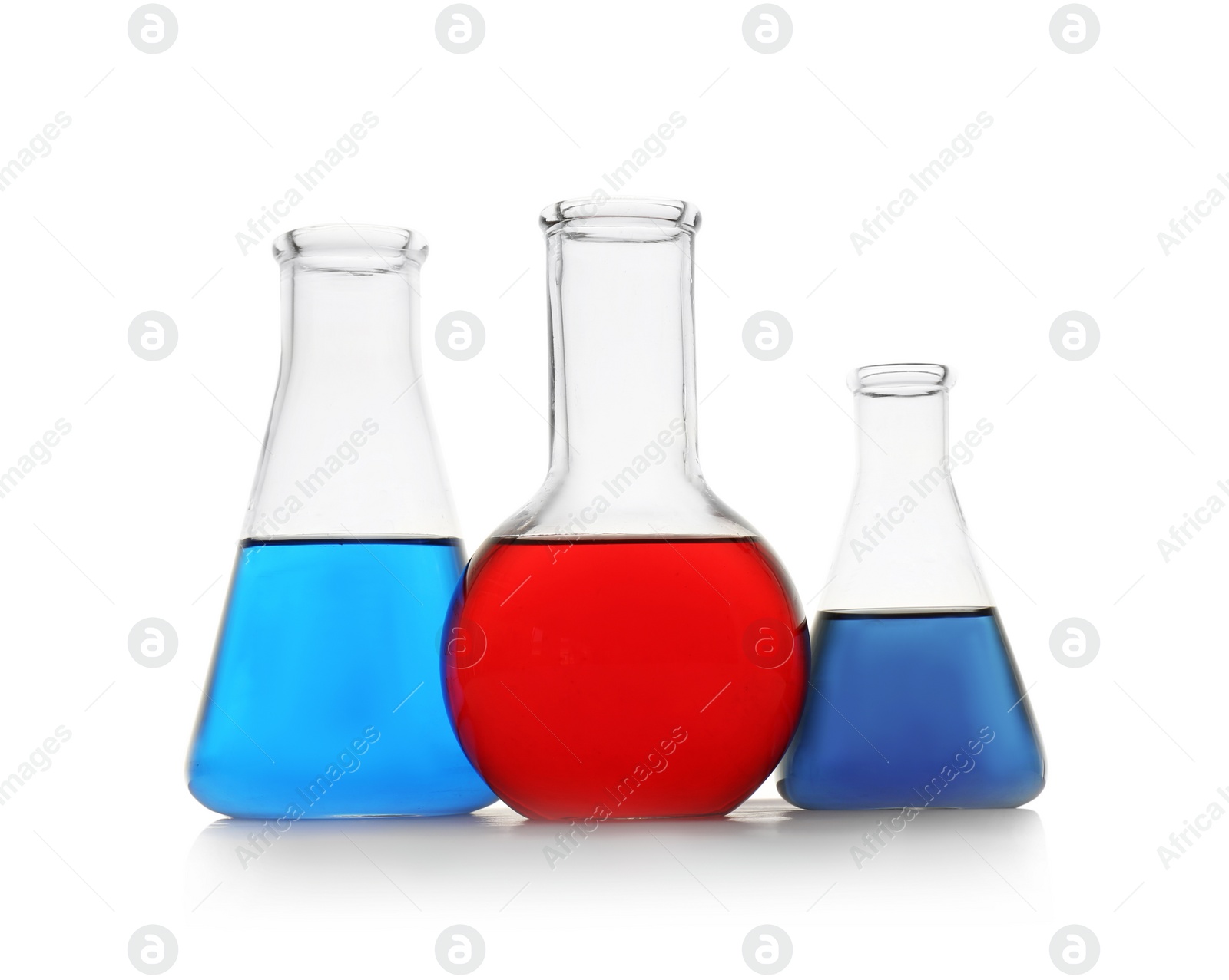 Photo of Chemistry glassware with color samples isolated on white