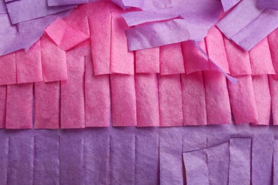 Photo of Cut tissue paper in different colors as background