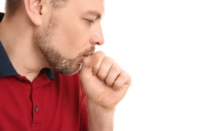 Photo of Man suffering from cough isolated on white, closeup