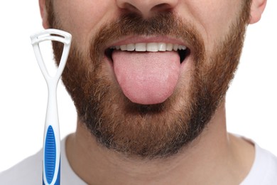 Photo of Man with tongue cleaner on white background, closeup