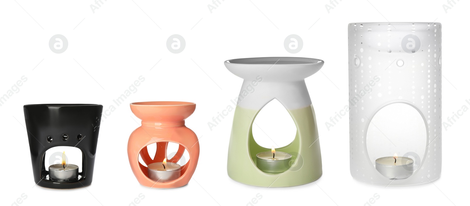 Image of Set with different stylish aroma lamps on white background. Banner design