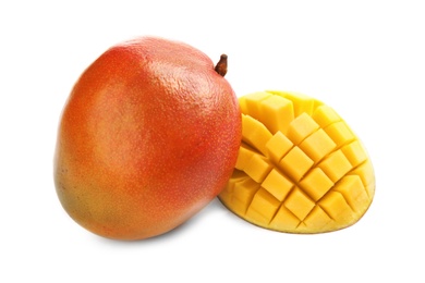 Photo of Delicious ripe mangoes on white background. Tropical fruit