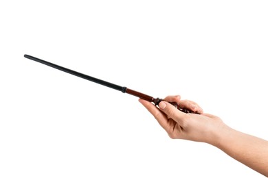 Photo of Woman holding wooden magic wand on white background, closeup