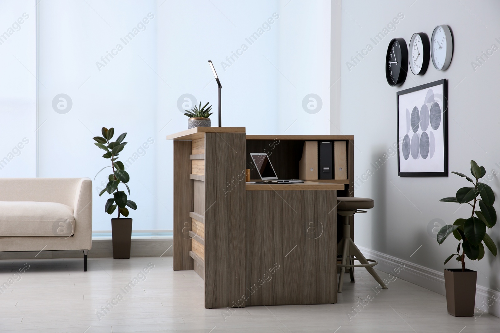 Photo of Lobby interior with stylish wooden receptionist desk