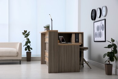 Lobby interior with stylish wooden receptionist desk