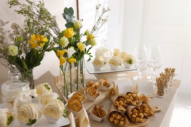 Tasty treats on table in room. Baby shower party