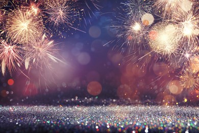 Image of 4th of July - Independence Day of USA. Festive background with fireworks and glitters, bokeh effect