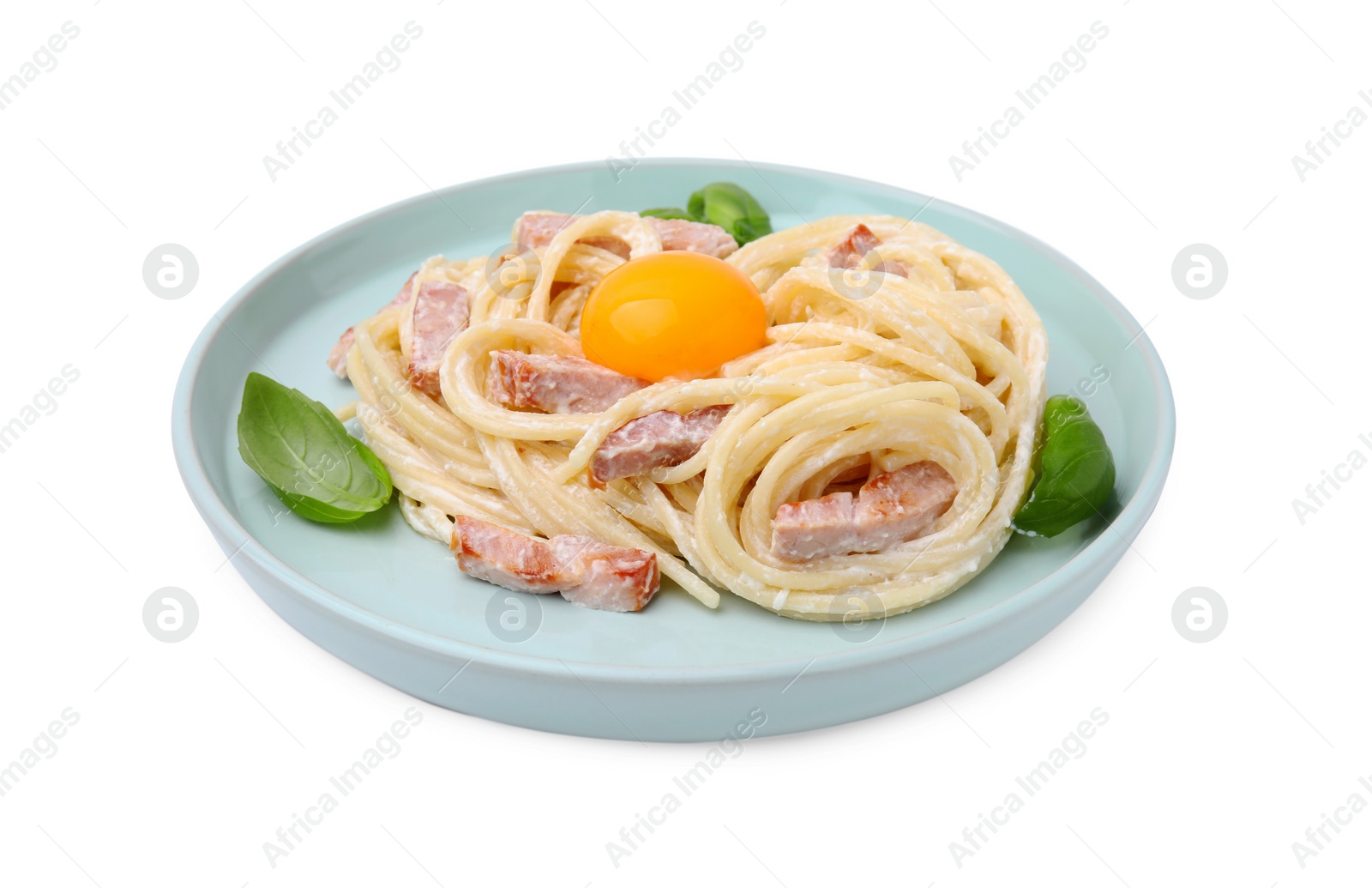 Photo of Plate of delicious pasta Carbonara with egg yolk isolated on white