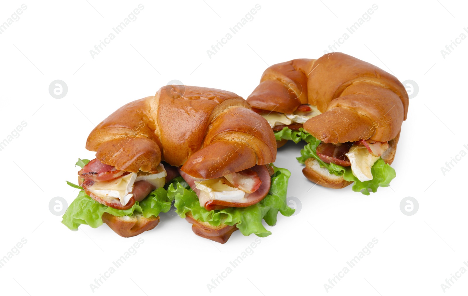 Photo of Tasty crescent rolls with brie cheese, ham and bacon isolated on white