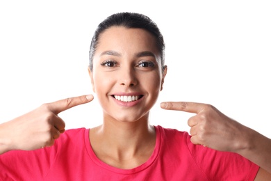 Photo of Young woman with healthy teeth on white background