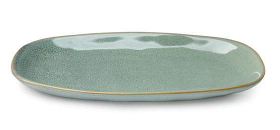 New green ceramic dish on white background