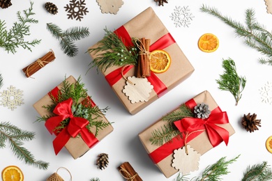 Photo of Composition with Christmas gifts on white background, top view