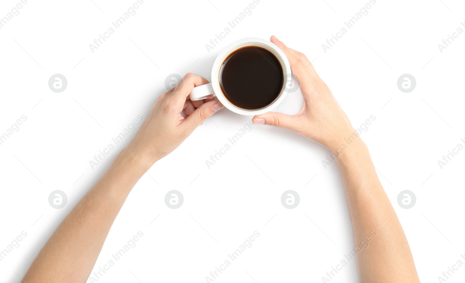 Photo of Woman holding cup of coffee on white background, top view