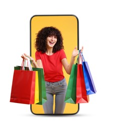 Online shopping. Happy woman with paper bags looking out from smartphone on white background