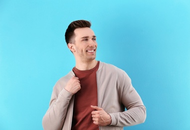 Photo of Charming young man on color background