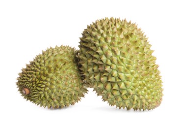 Photo of Whole ripe durian fruits on white background