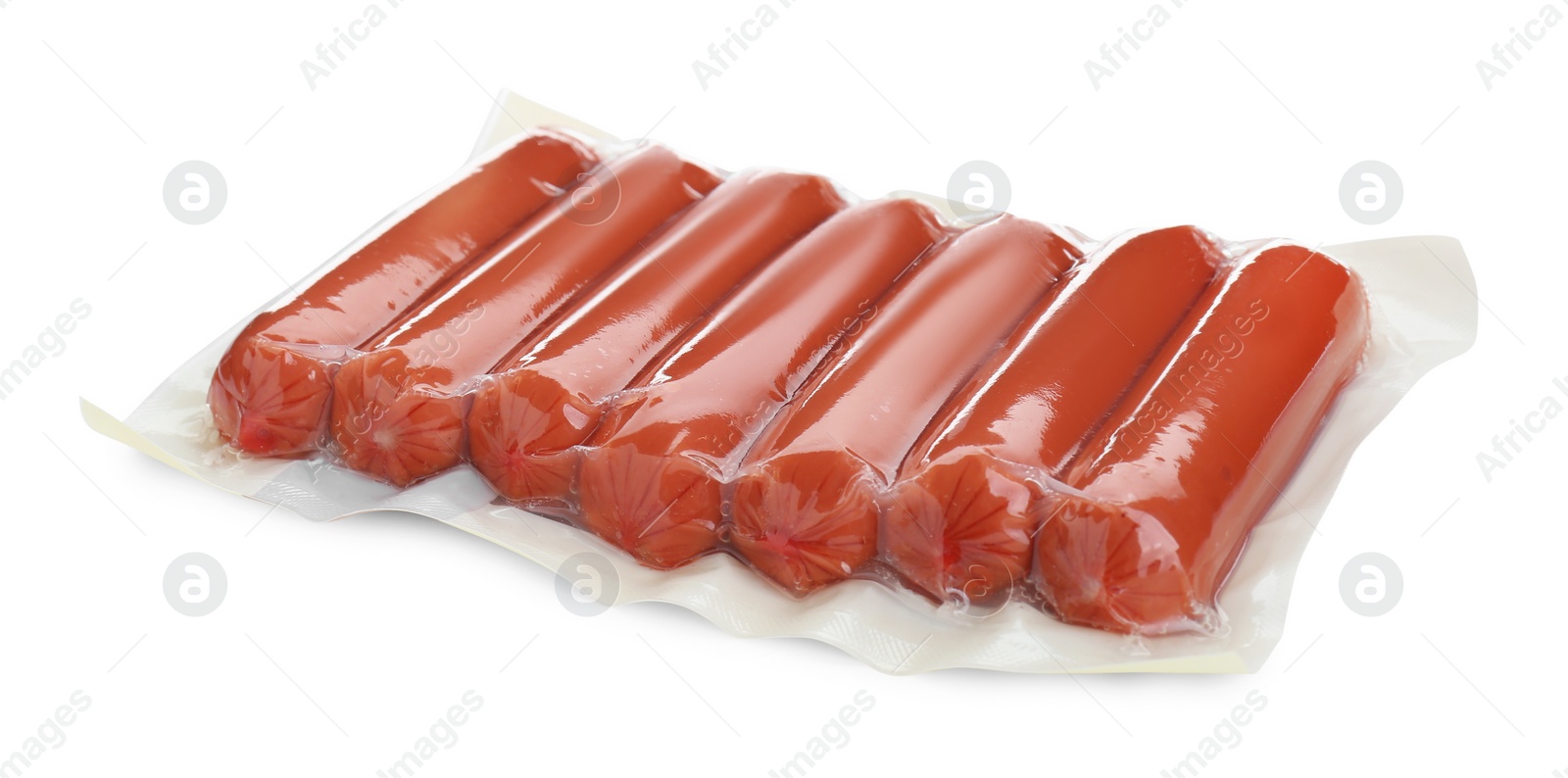 Photo of Vacuum pack with sausages isolated on white. Meat product